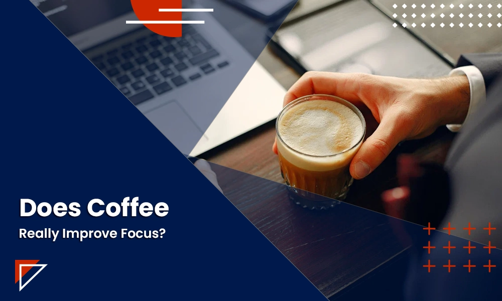 Coffee and focus concept showing a person drinking coffee while working on a laptop.